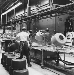 Manual enamel dipping of washing machine drums